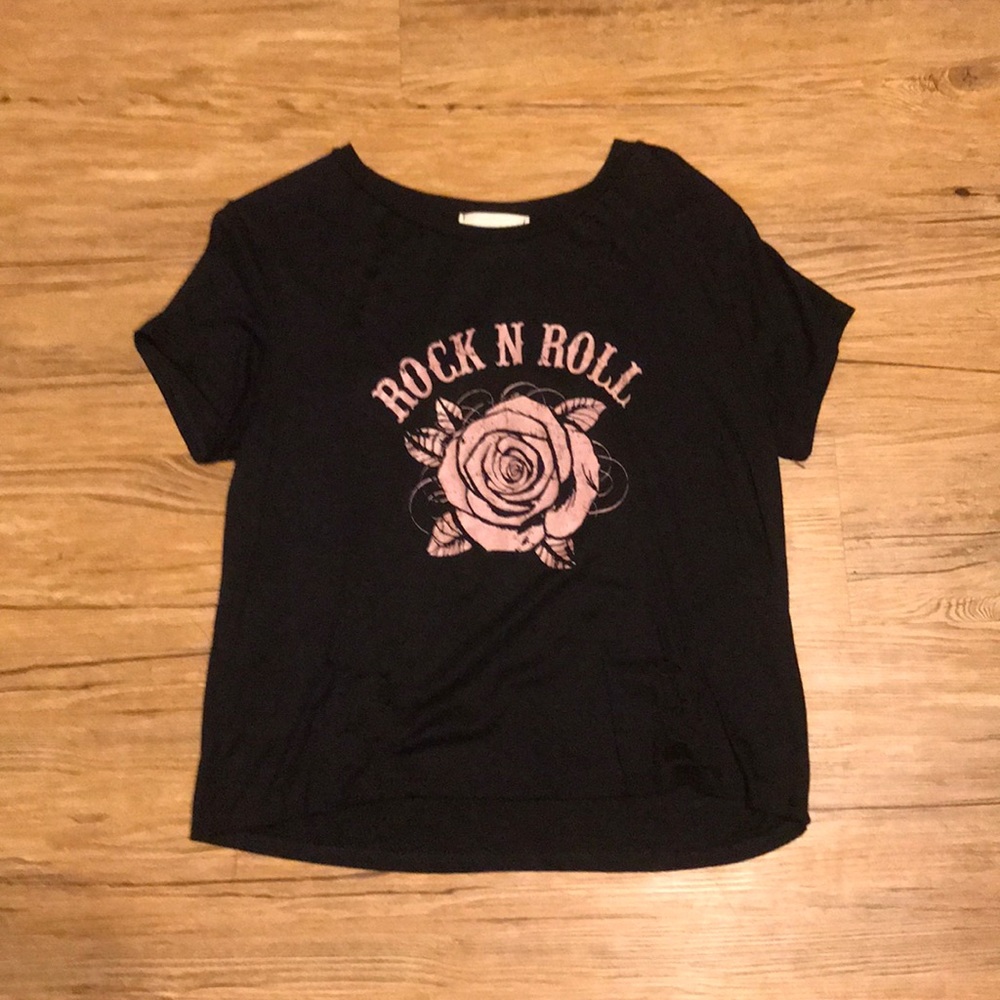 Black rock n roll tee!! Has holes for character!!